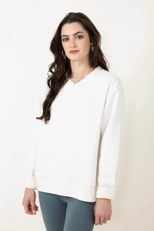 The North Face Evolution V Neck Sweatshirt for Women in White | NF0A86UQ-QLI